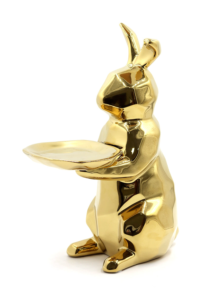 Figura de cerámica dorada con forma de conejito con bandeja soporte de llaves