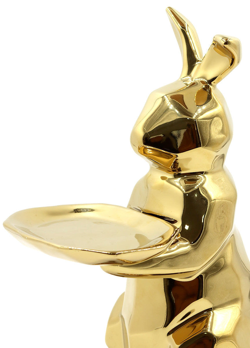 Figura de cerámica dorada con forma de conejito con bandeja soporte de llaves